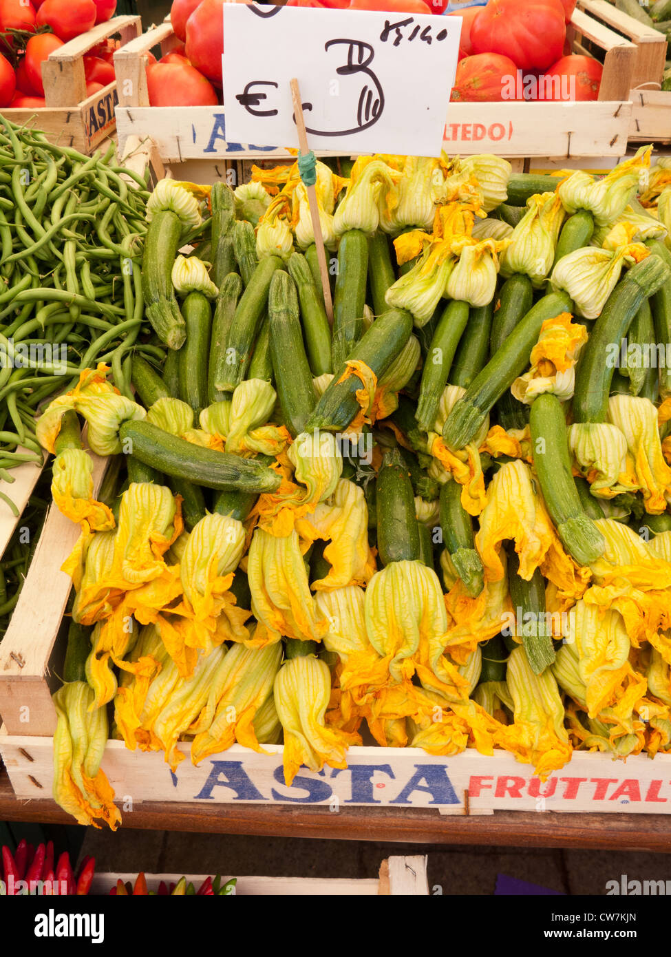 A box of fresh courgettes at fruit and veg market near the Rialto ...