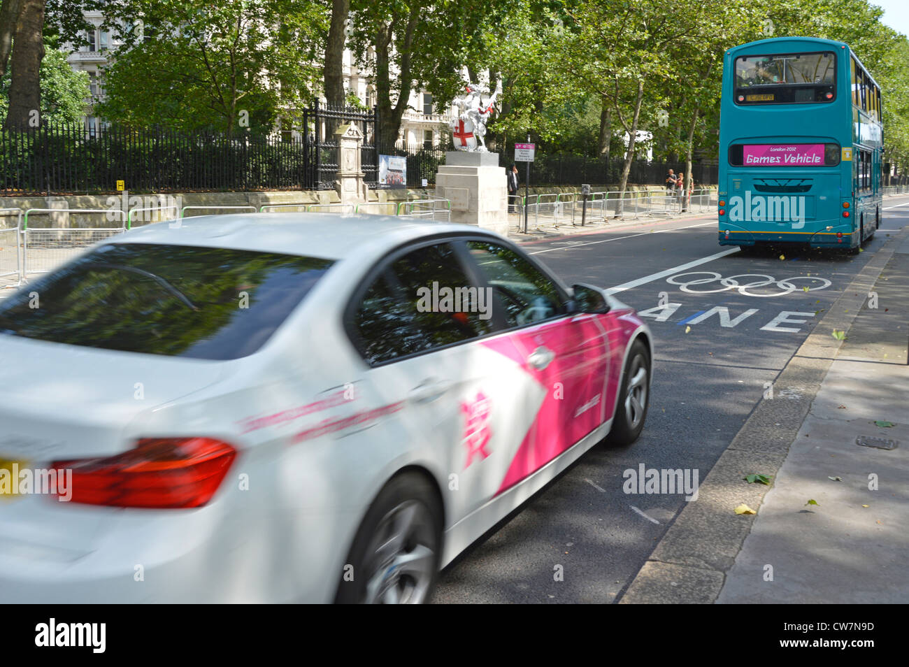 London 2012 Olympic designated traffic lanes with official car following a games authorised double decker bus Stock Photo