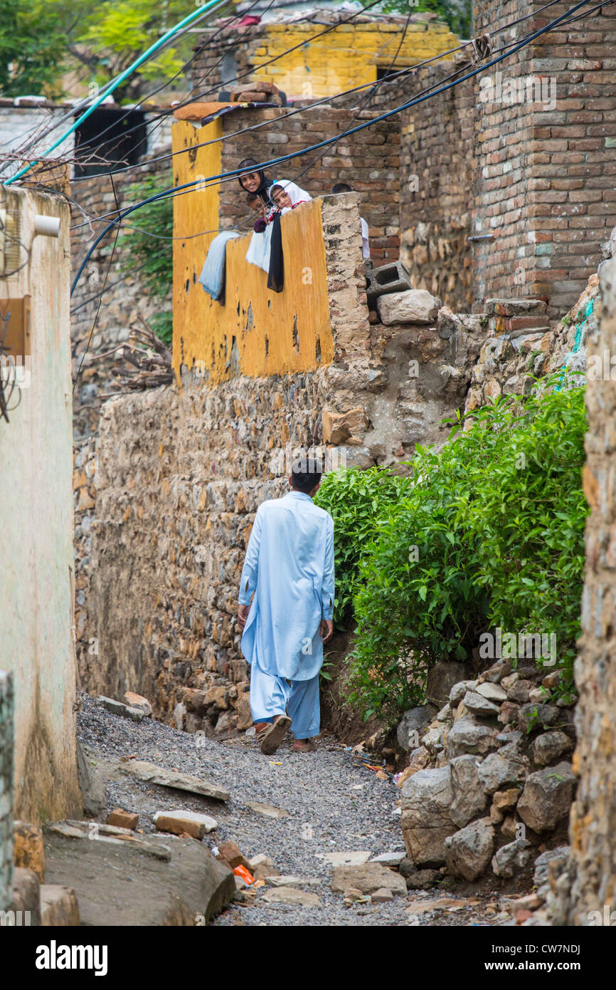 Narrow alley in Said Pur Village, Islamabad, Pakistan Stock Photo