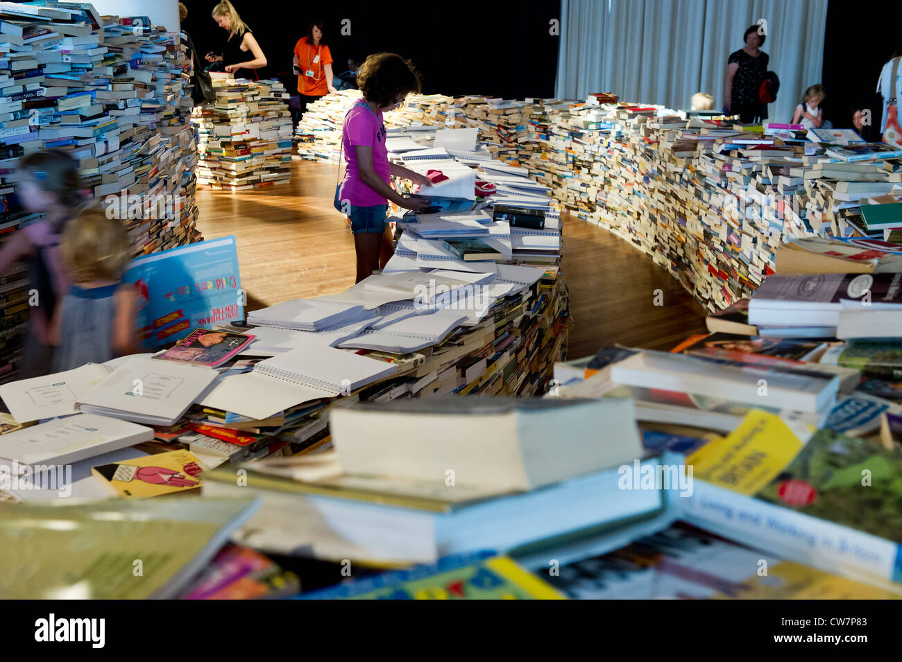 Created by Marcos Saboya and Gualter Pupo, aMAZEme immerses the audience in a labyrinth of books. Stock Photo