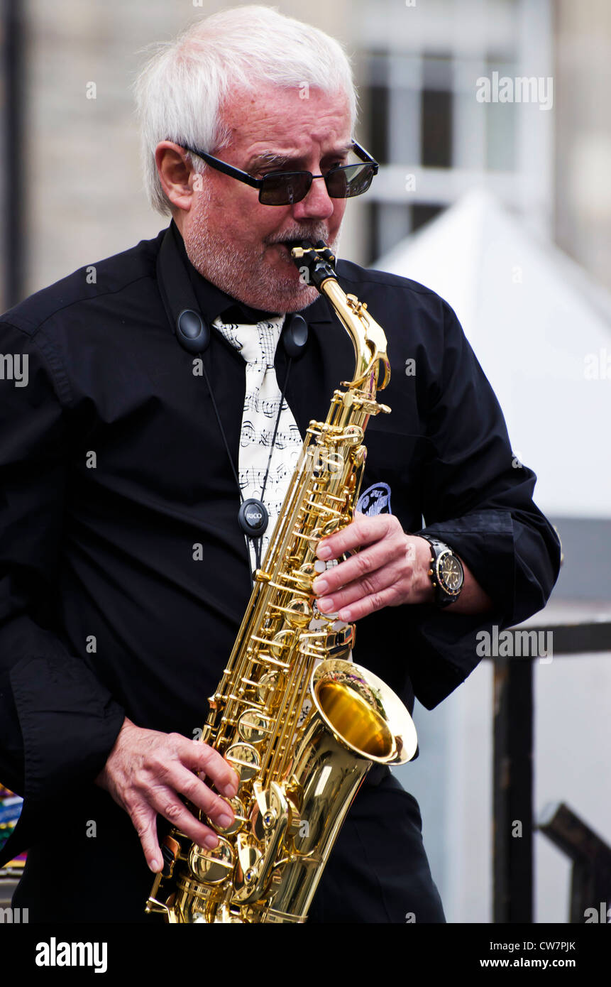 Sax player the Savannah Jazz Band playing on the opening day of the