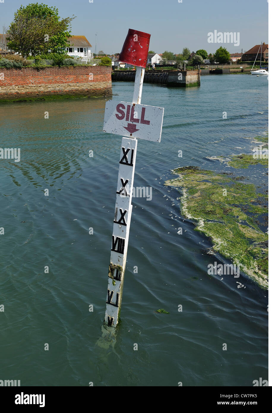Roman numerals on depth gage Emsworth Marina Emsworth Chichester Harbour Hampshire UK Stock Photo