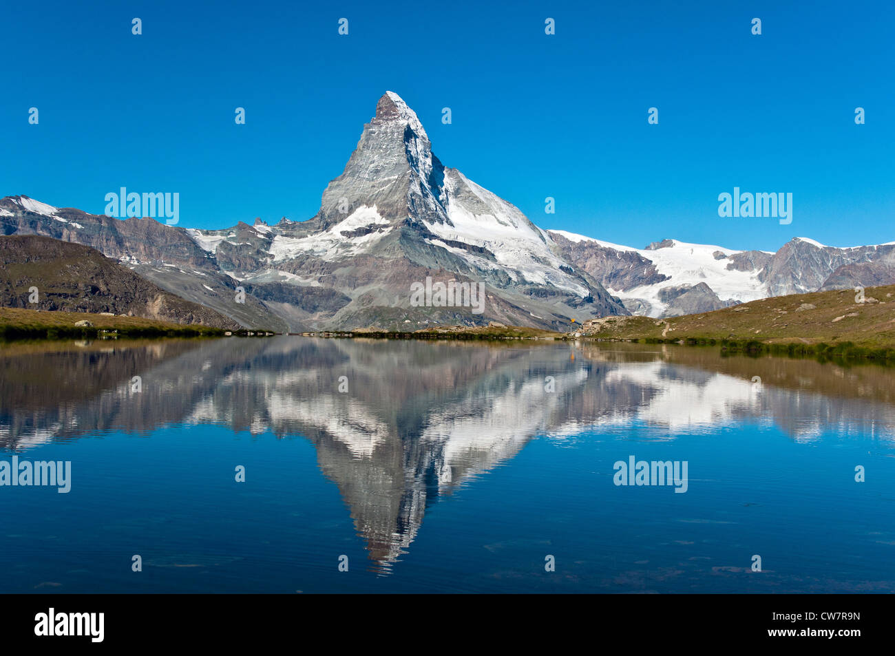 Stellisee lake with Matterhorn reflected in the background, Zermatt, Wallis or Valais, Switzerland Stock Photo