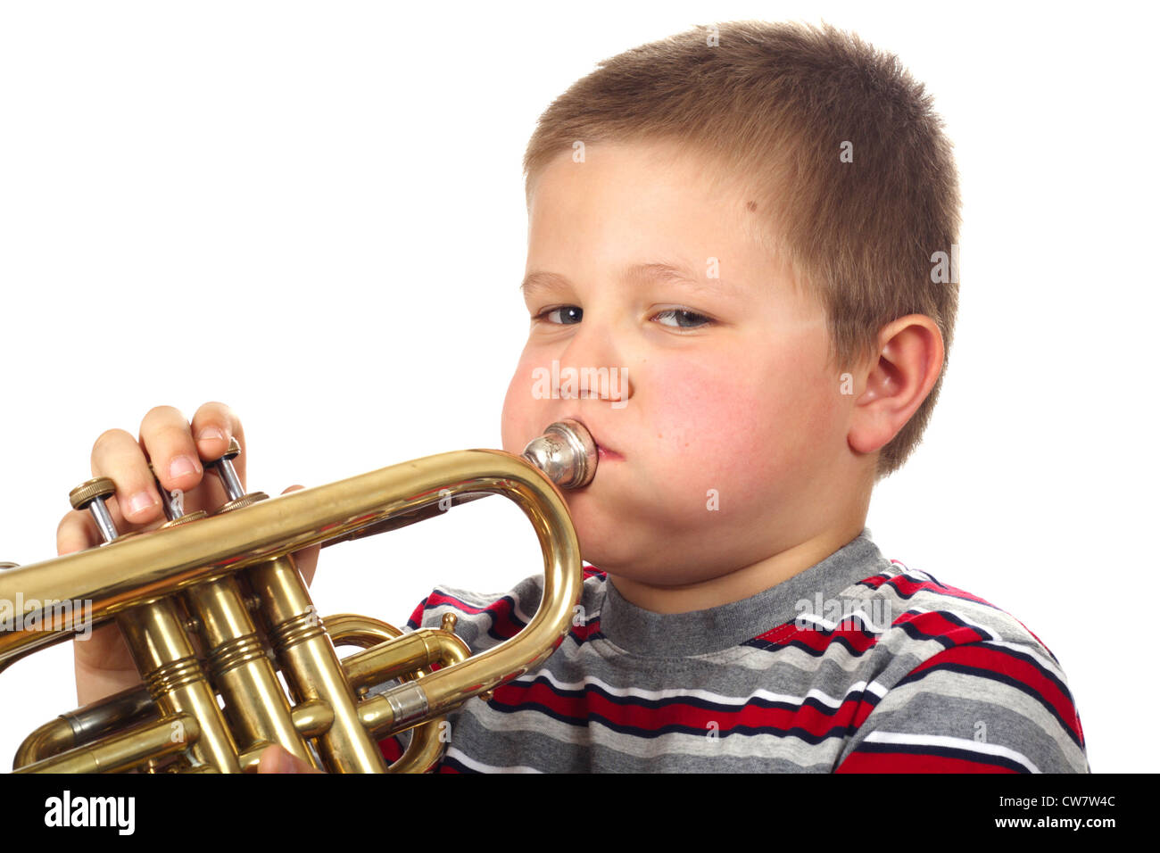 Boy Blowing Trumpet photo on the white background Stock Photo Alamy