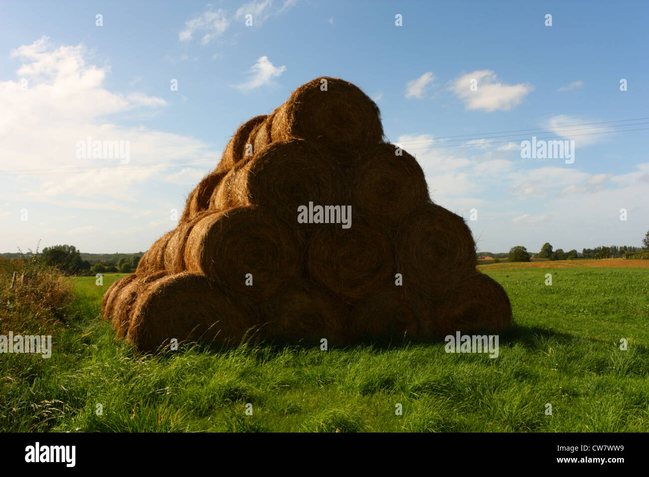 Haystacks arrange in pyramide Stock Photo - Alamy