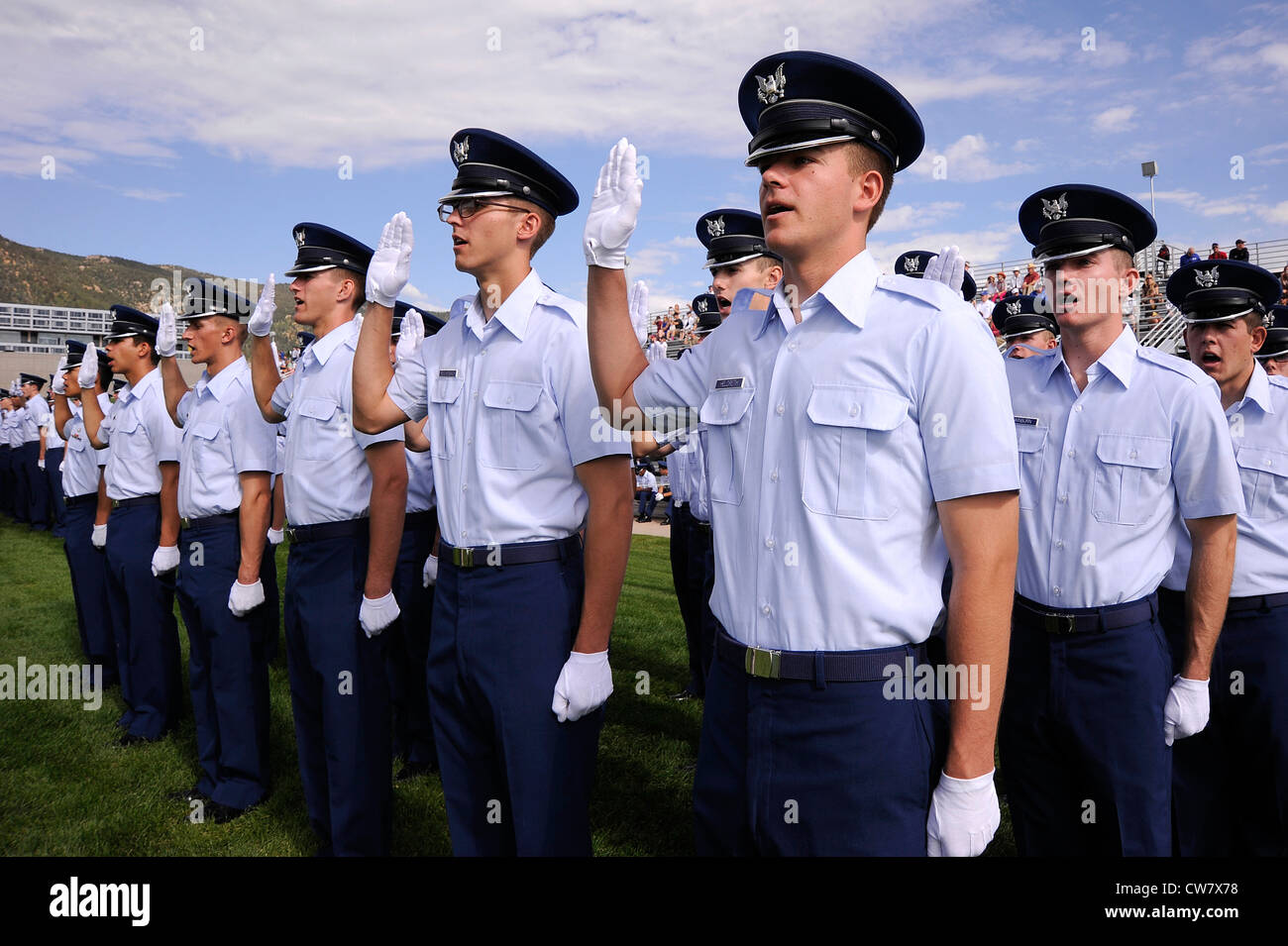 Basic cadet Nathaniel Heldreth recites the Honor Oath during the Class of 2016 Acceptance Parade on the U.S. Air Force Academy's Stillman Parade Field in Colorado Springs, Colo. Aug 7, 2012. During Acceptance, the new freshmen march toward the Cadet Wing in an inverse wedge formation to signify their entrance into the Cadet Wing. Stock Photo