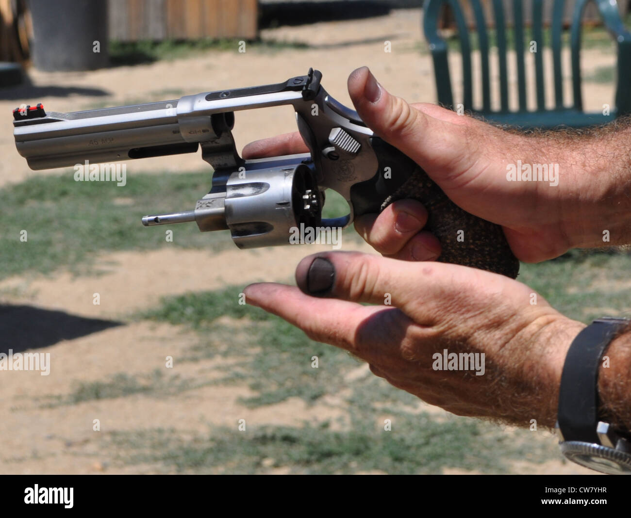Loading a revolver Stock Photo - Alamy