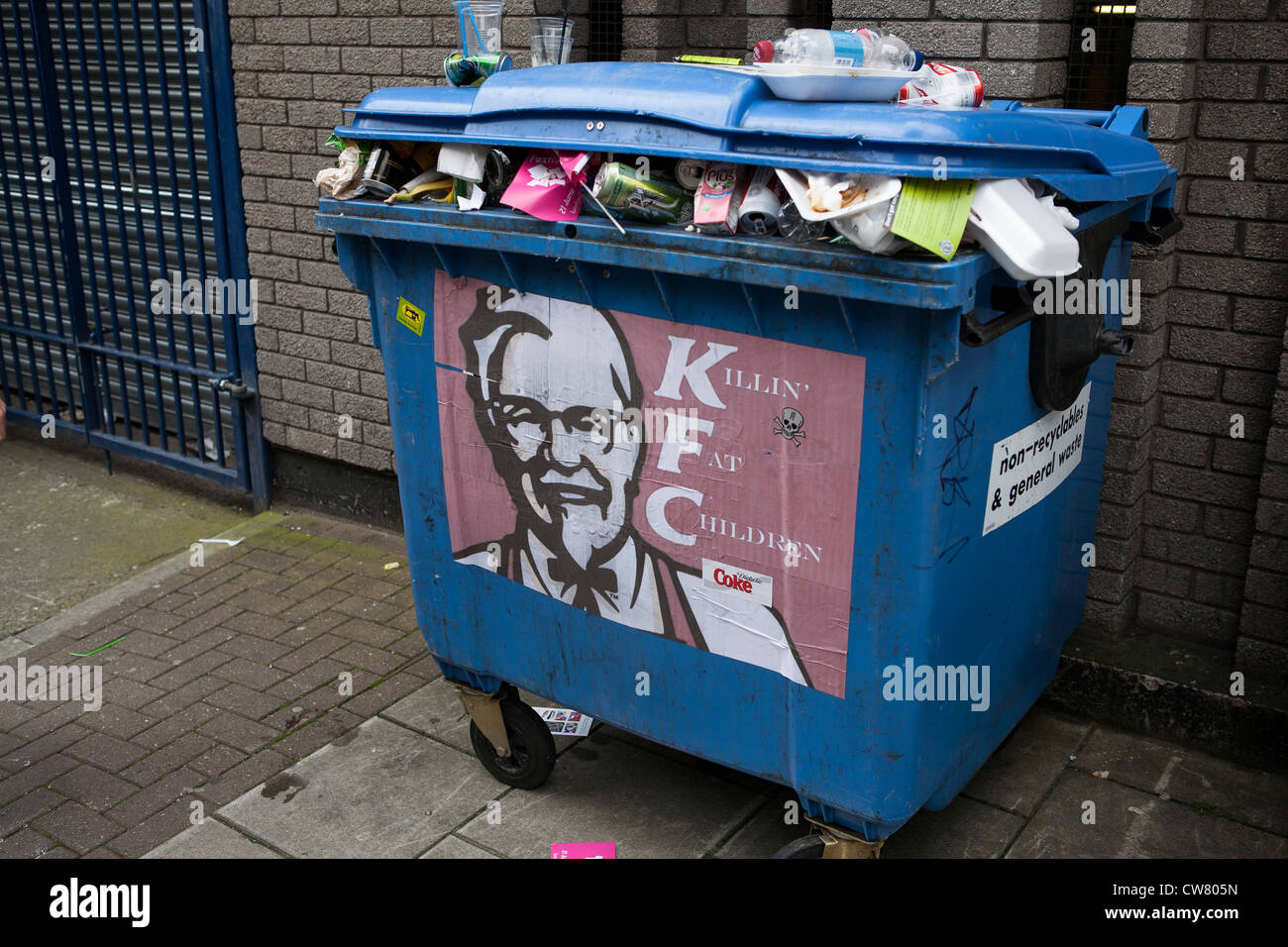 KFC Filling Fat Children poster on a waste bin at See No Evil street