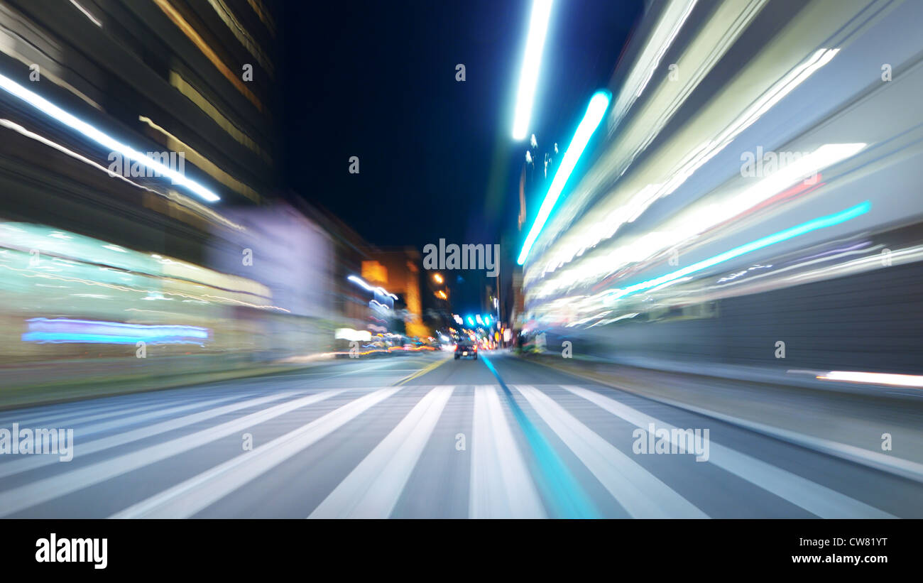 Motion blurred view of night driving through the city Stock Photo - Alamy
