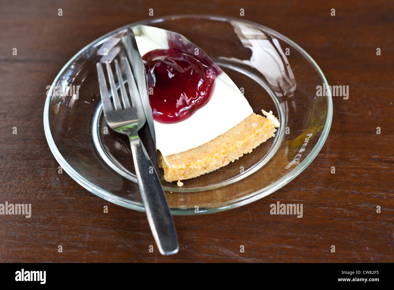 Blue Berry Cheese Cake on Glass plate. Stock Photo