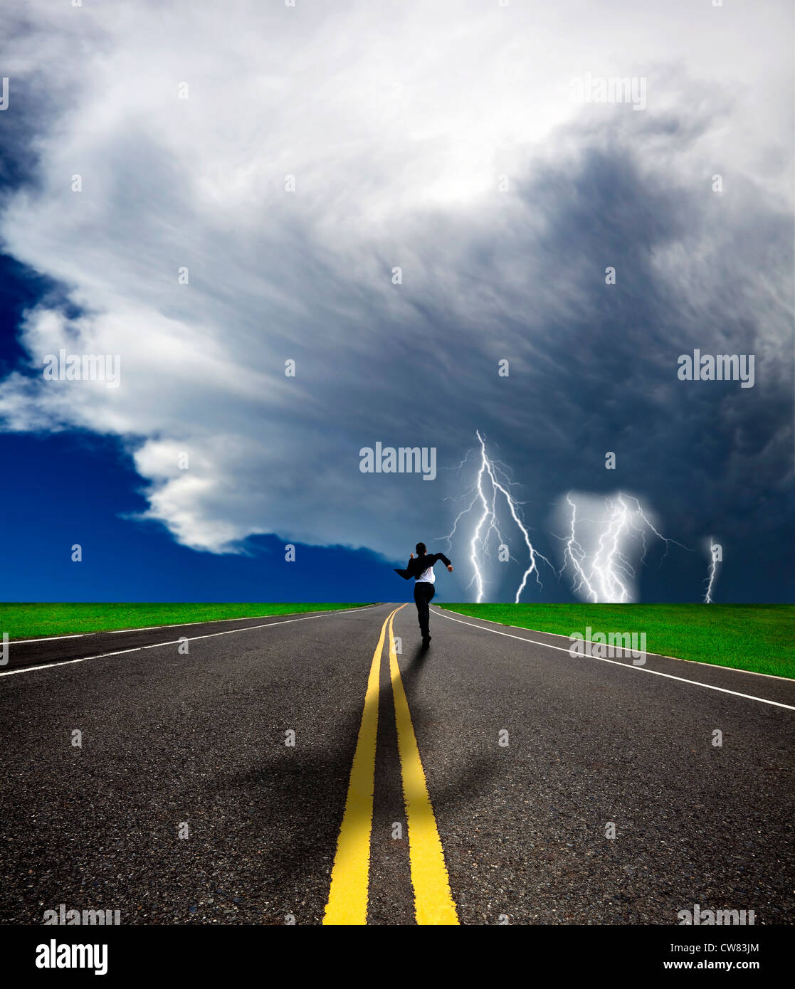 businessman running to the storm on the road Stock Photo