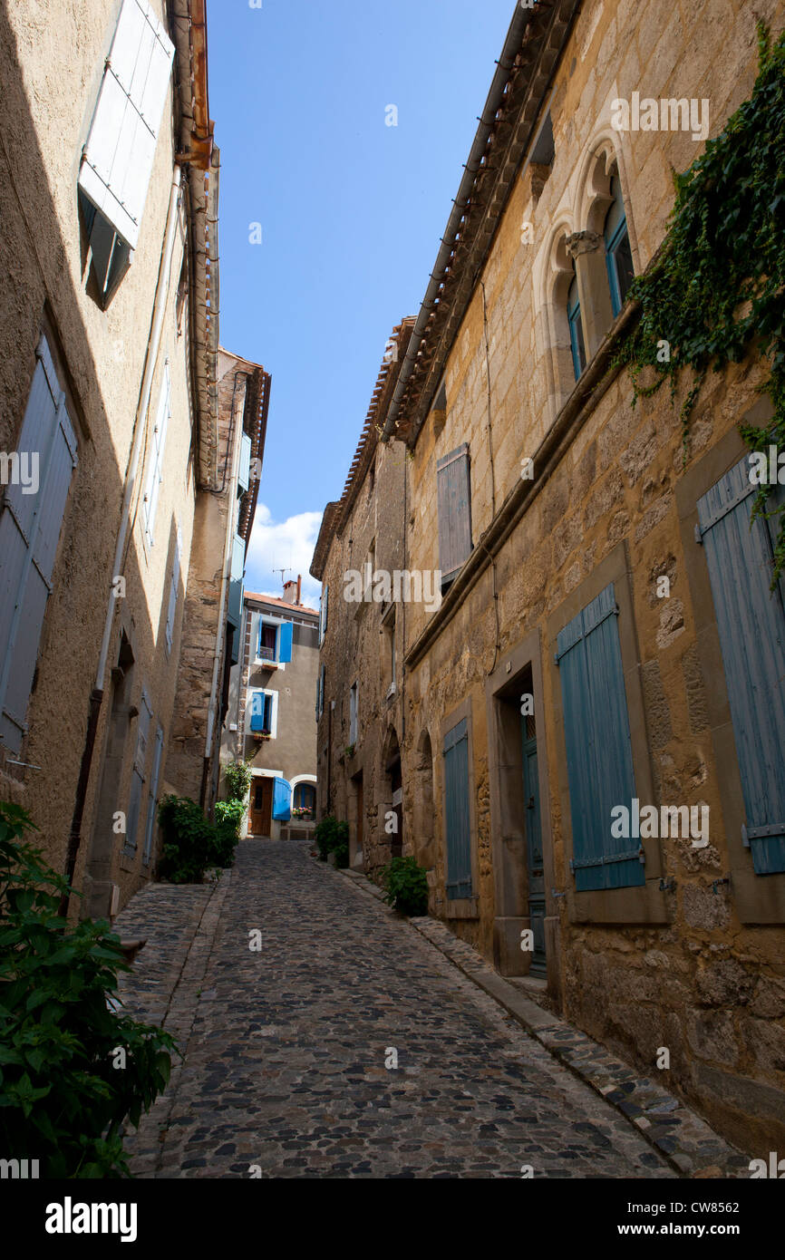 A narow street in the village of Caune-Minervois, in Southern France Stock Photo