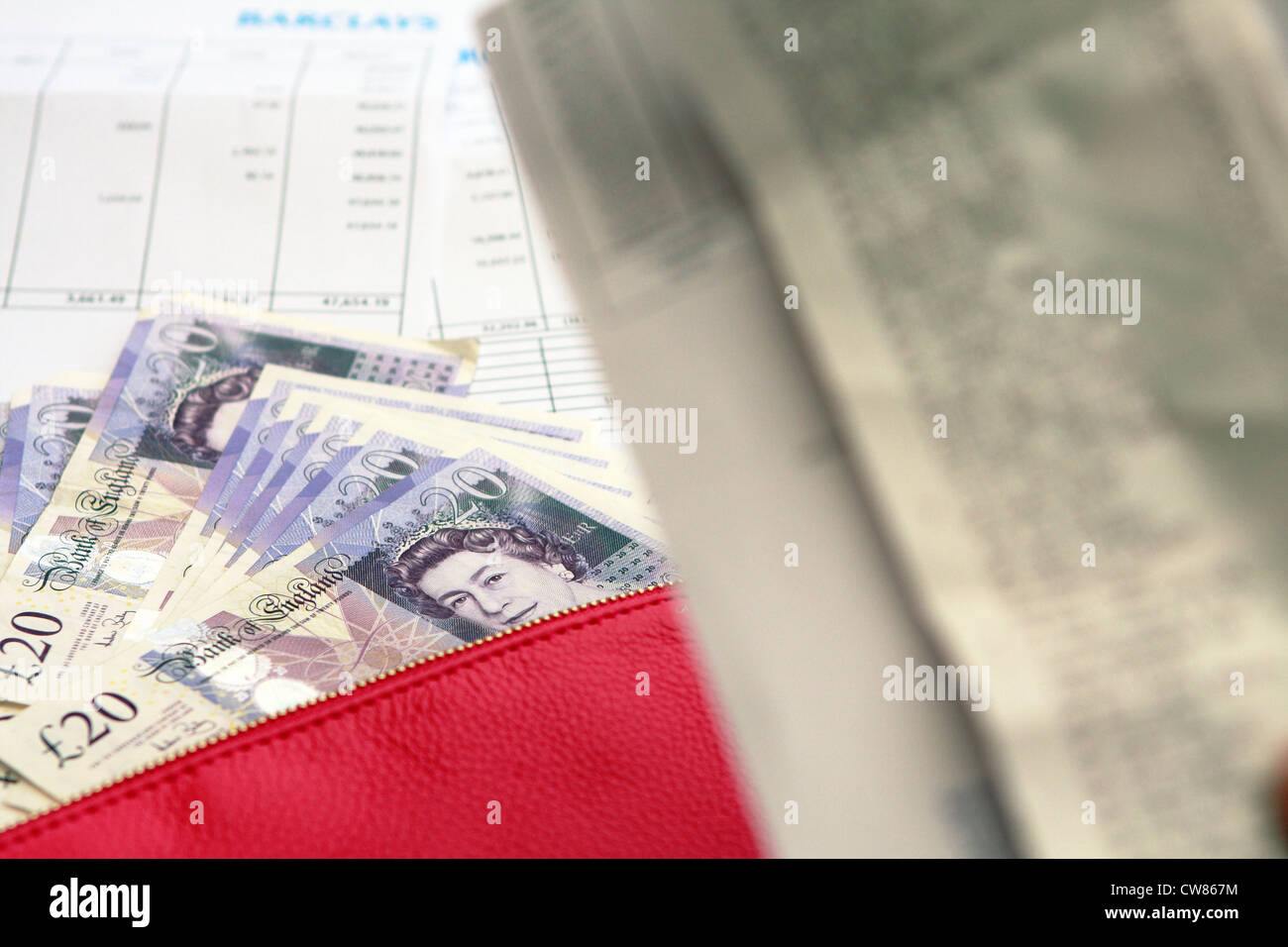 sterling notes, a lady's purse and bills Stock Photo - Alamy