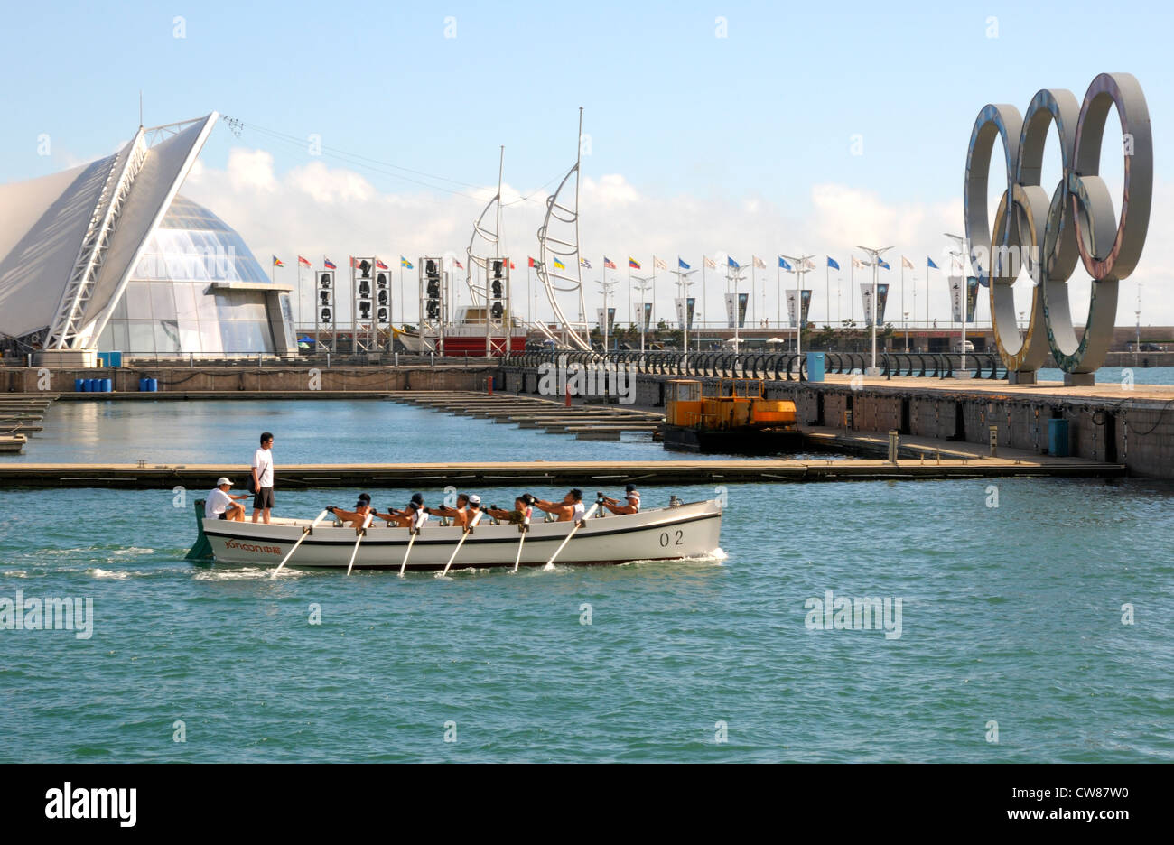 Sea cadets rowing in Qingdao marina. Stock Photo