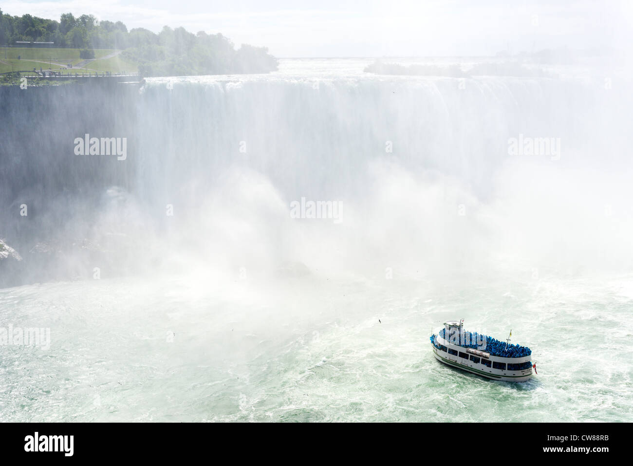 Maid of the Mist tour boat in front of the Horseshoe Falls viewed from the Canadian side, Niagara Falls , Ontario, Canada Stock Photo