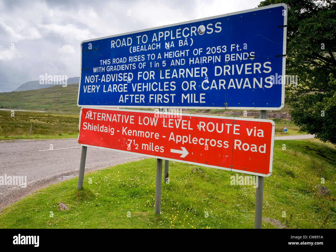 The road sign at the foot of Bealach Na Ba, the winding mountain road to Applecross in the Highlands of Scotland, UK Stock Photo