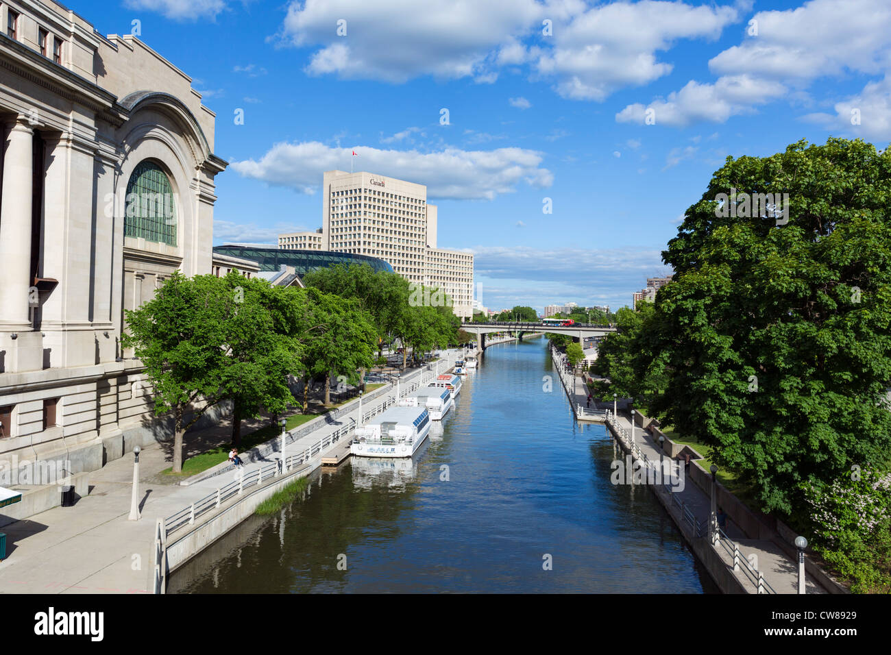 Rideau Canal from Rideau Street bridge with old railway station to left (now a conference centre), Ottawa, Ontario, Canada Stock Photo