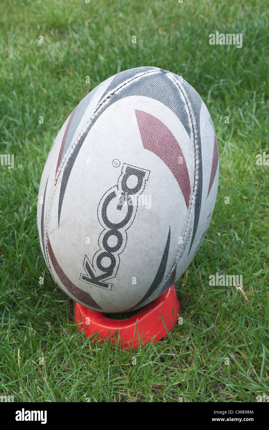 Rugby ball on a kicking tee Stock Photo - Alamy