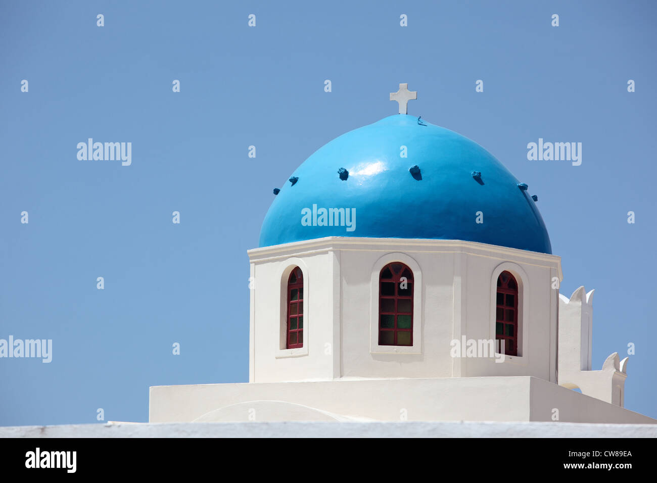 Greece, Cyclades Islands, Santorini, Oia, Caldera Square, Blue dome of Panagia of Platsani church. Stock Photo