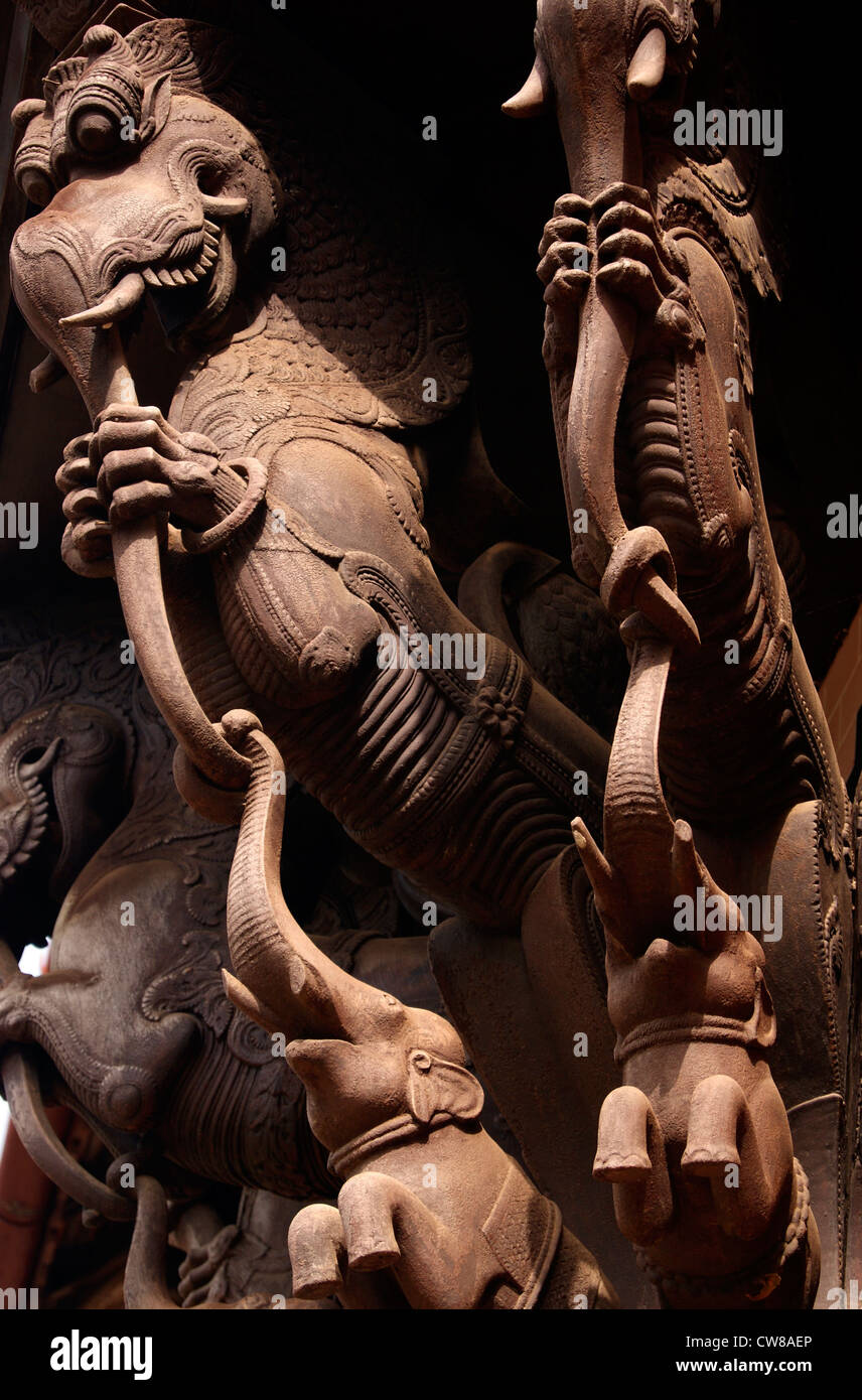Napier Museum Palace Typical Ancient carved Wooden Sculpture art of Dragon and Elephants Stock Photo