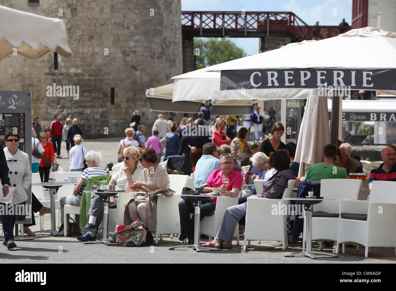 Tourists having lunch at a French Creperie in La Rochelle Stock Photo