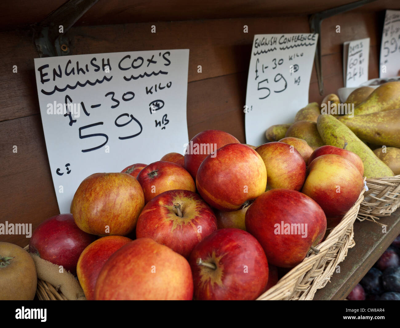 Village greengrocer display of local produce including English Cox's apples Stock Photo