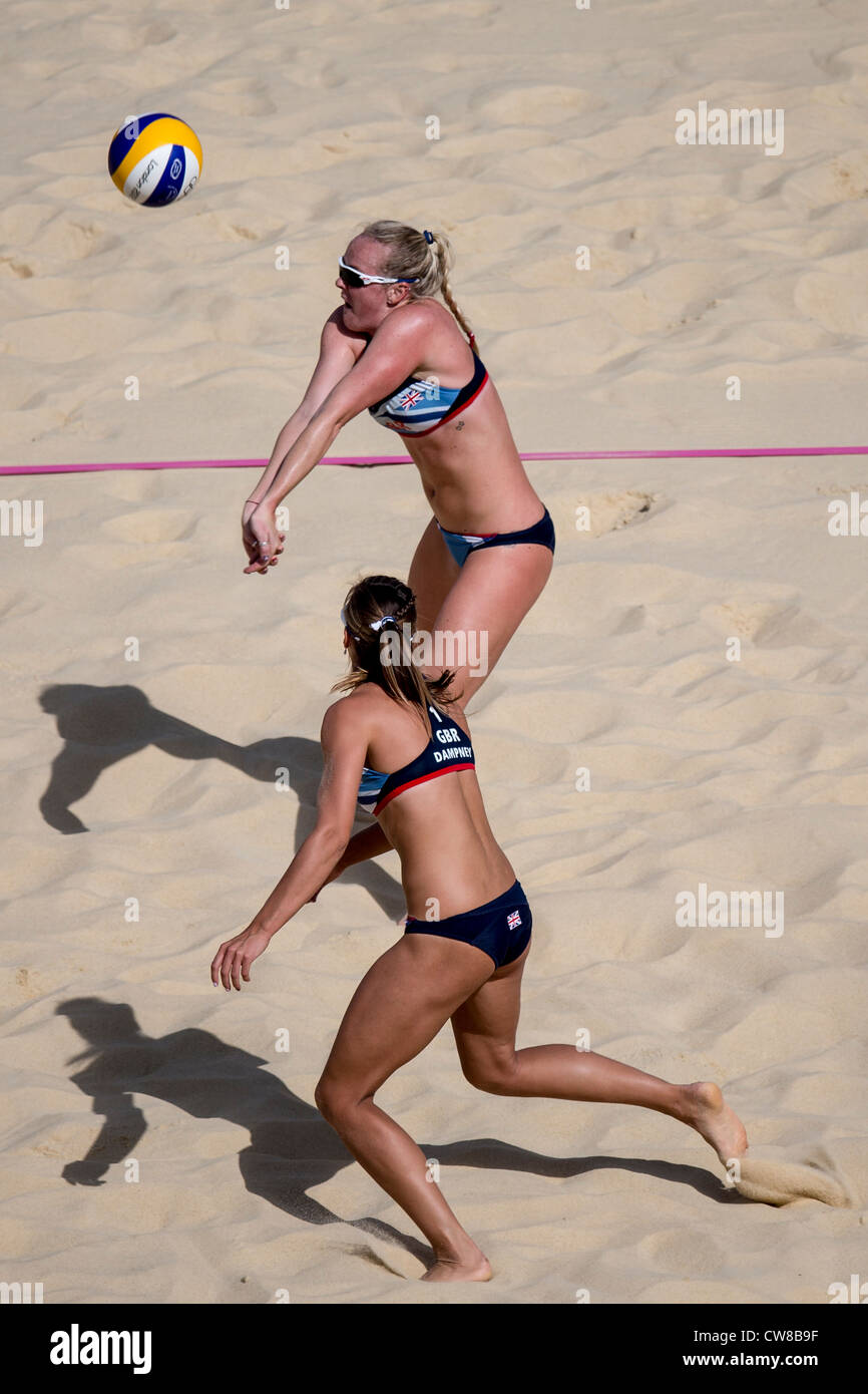 Zara Dampney and Shauna Mullin (GBR) competing in Beach Volleyball at the Olympic Summer Games, London 2012 Stock Photo