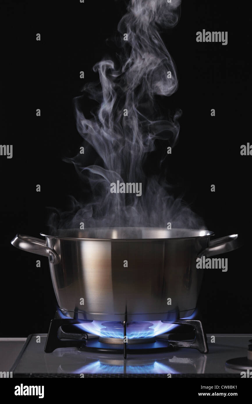Smoke Emitting From Cooking Pot Stock Photo Alamy