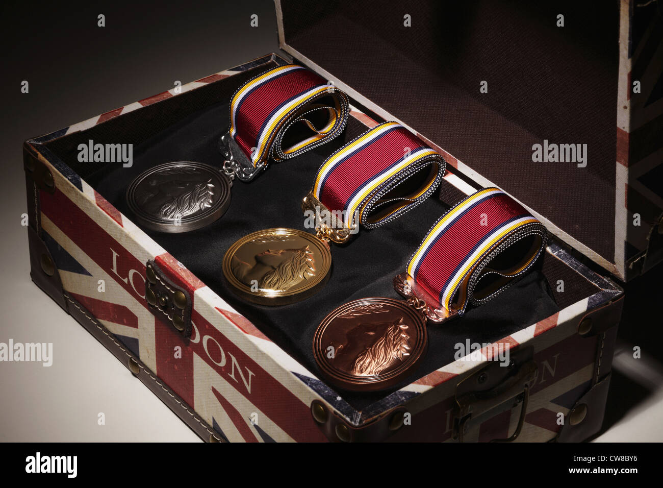 Close Up Of Medals And Briefcase Stock Photo