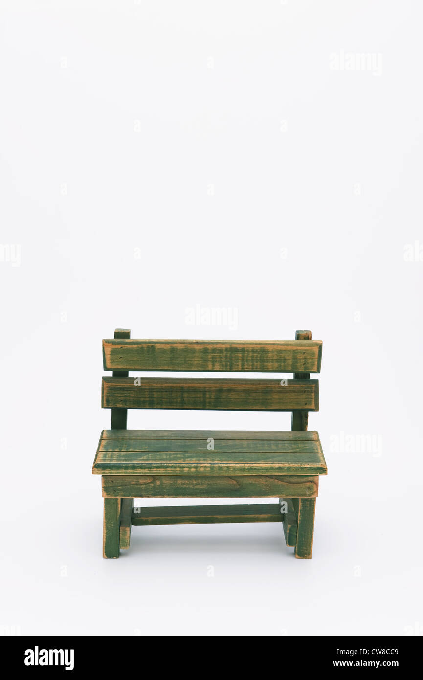 Empty Wooden Bench Against White Background Stock Photo