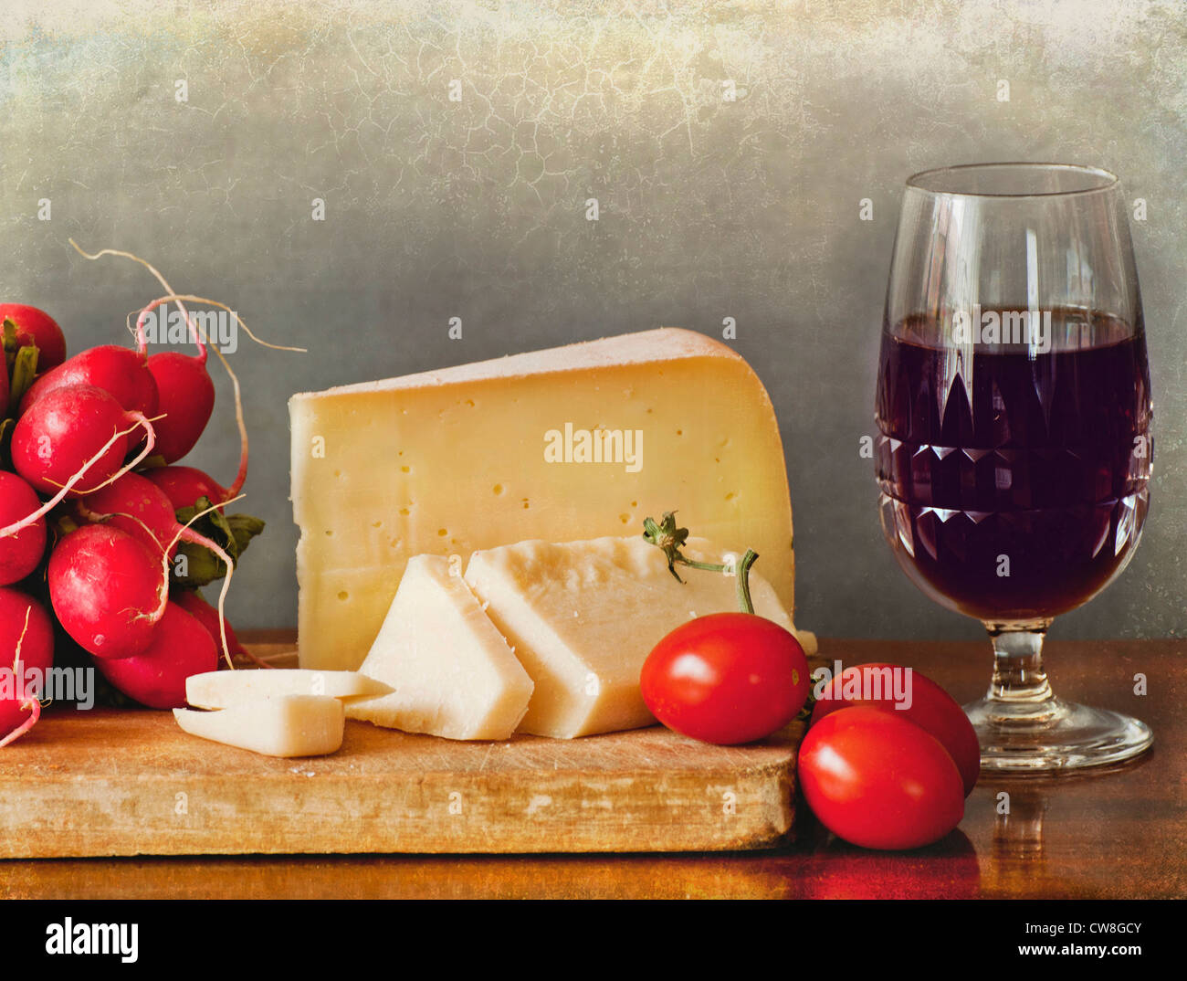 Gourmet snack with Italian cheese assortment, raw vegetables and a