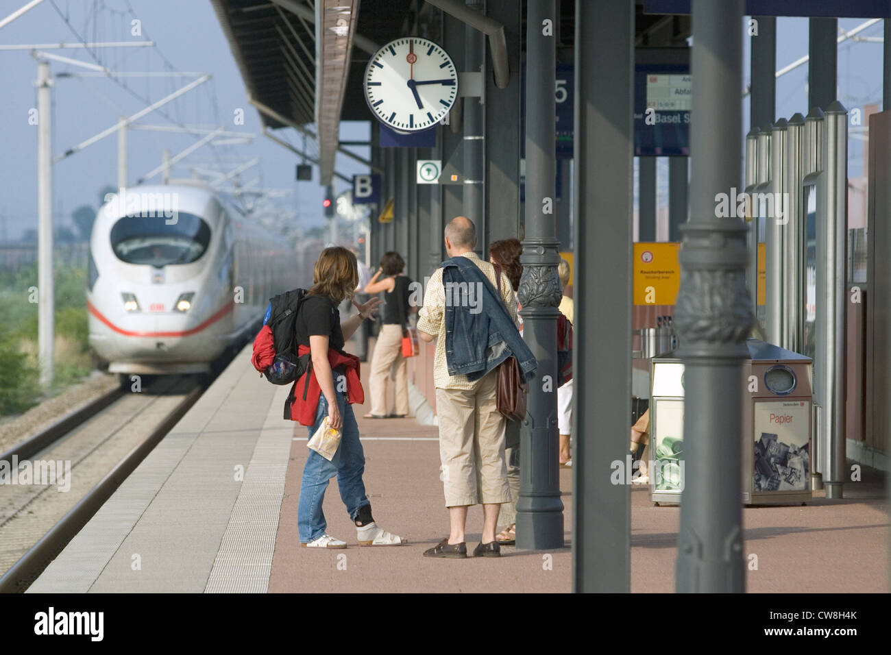 Baden-Baden, travelers wait at the station for the arrival of the train Stock Photo