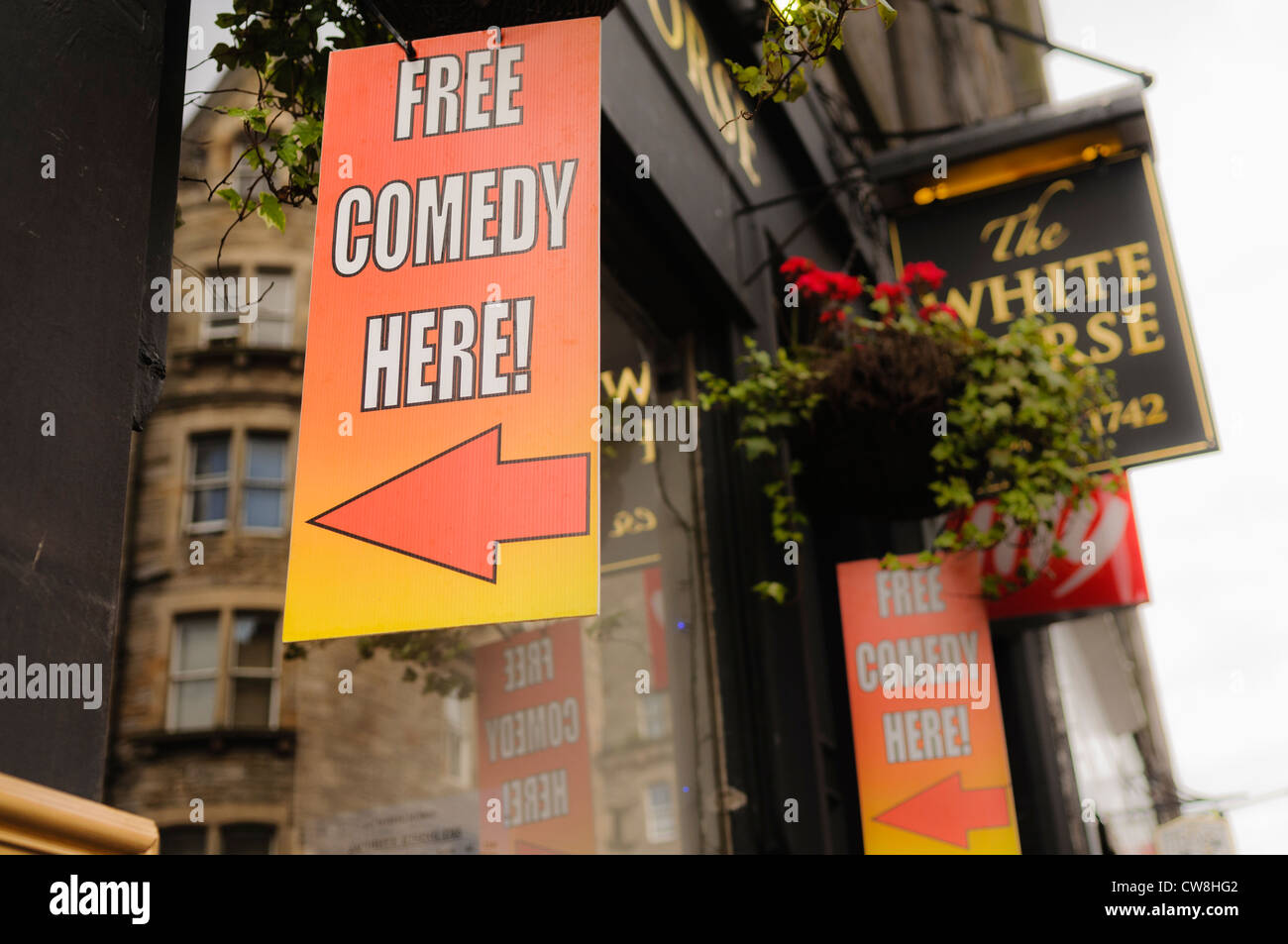Signs advertising free comedy events outside the White Horse pub in Edinburgh Stock Photo