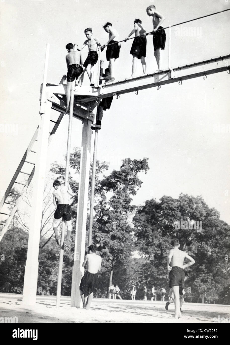 Physical education: crossing crossbar and going down bar Stock Photo ...