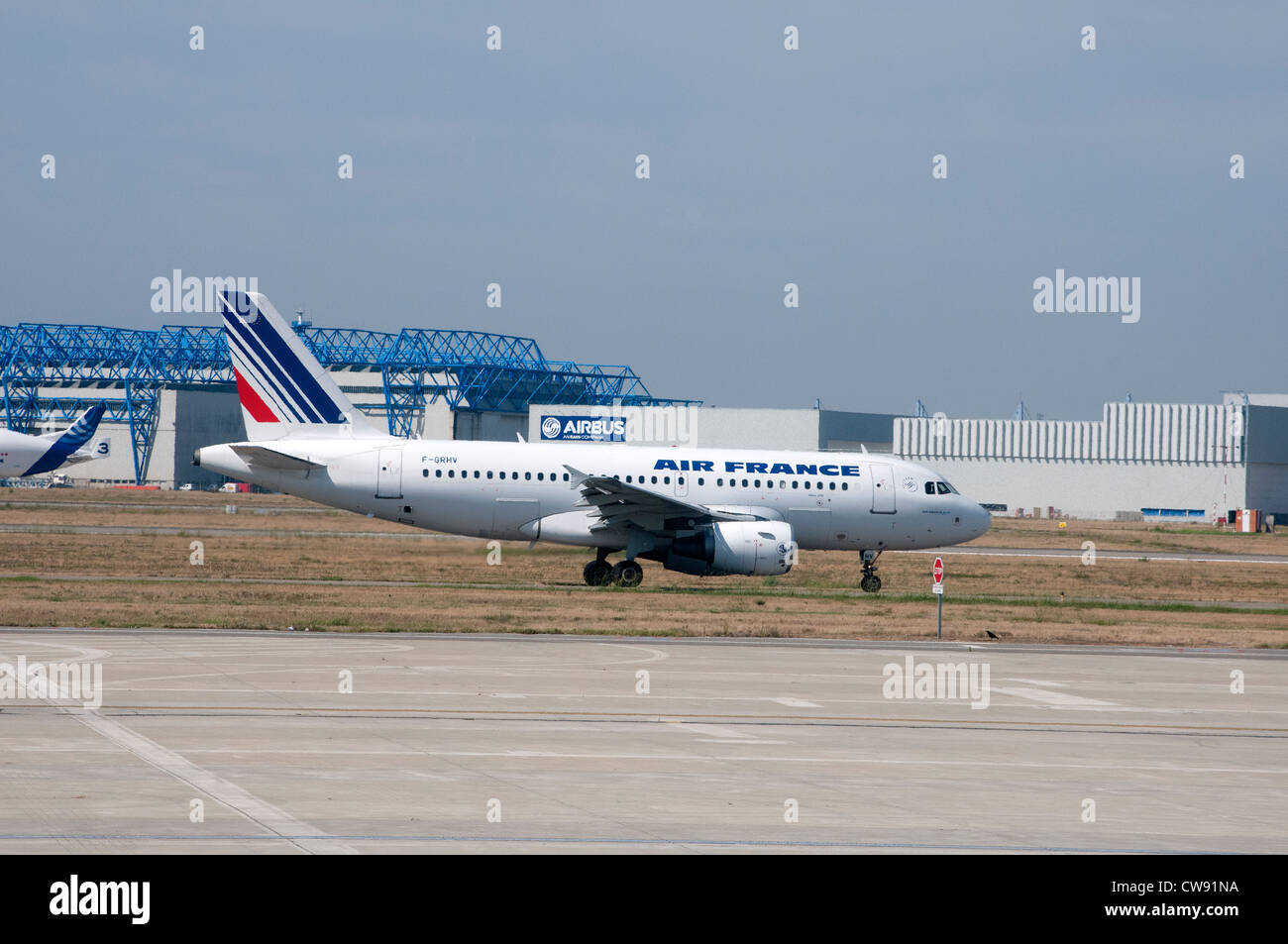 Airbus Industrie HQ in Toulouse France An Airbus A319 aircraft of the Air France fleet on the taxiway Stock Photo
