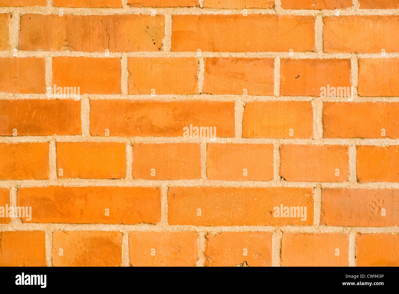 Orange brickwall background Stock Photo