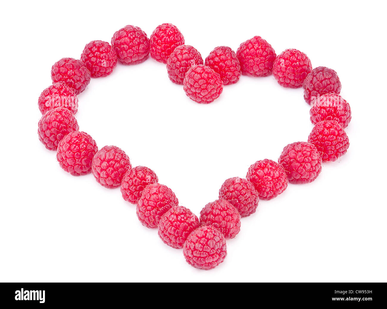 Raspberry shape as heart on white Stock Photo