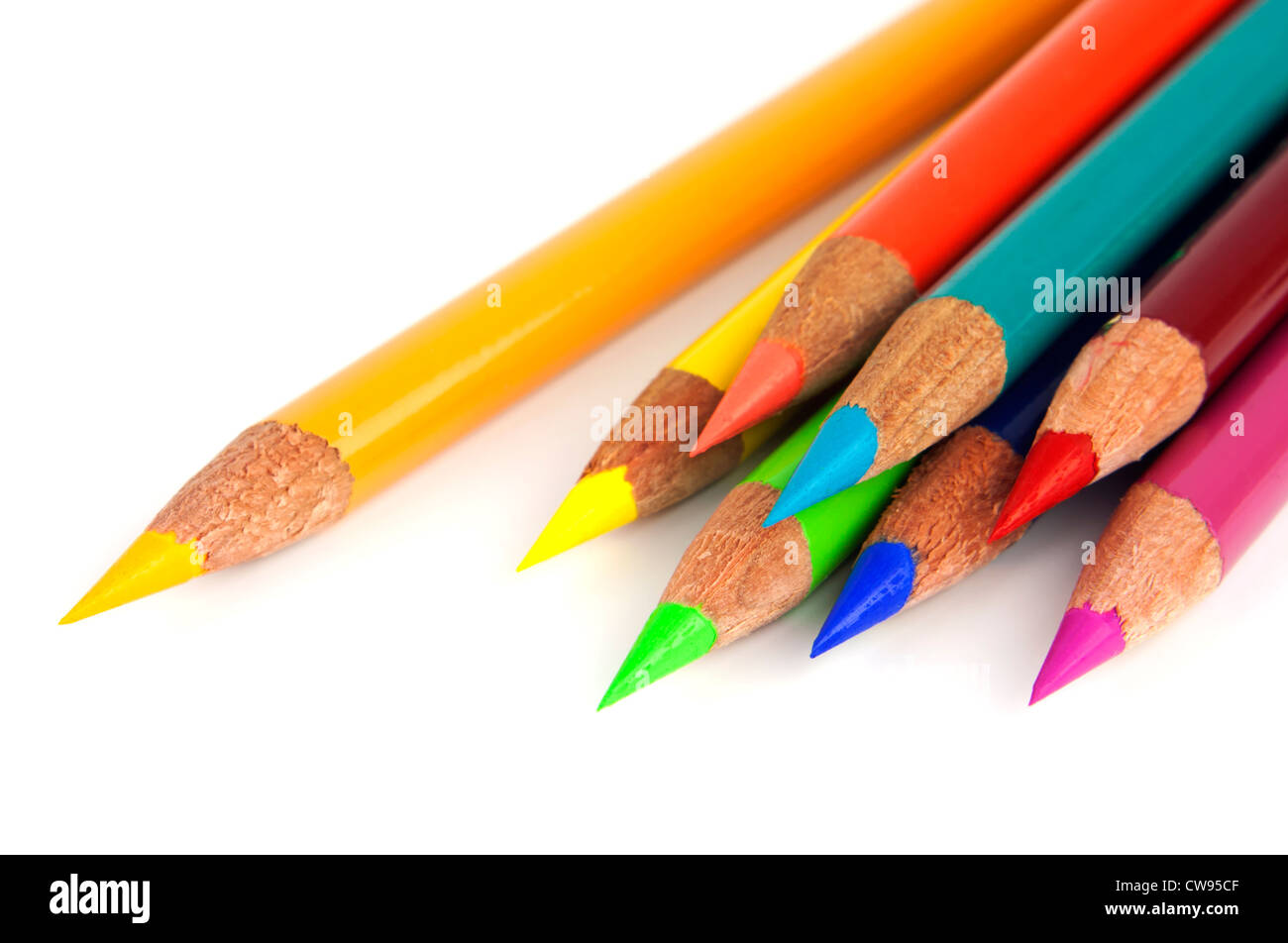 Set of vibrant rainbow colored pencils isolated on white background