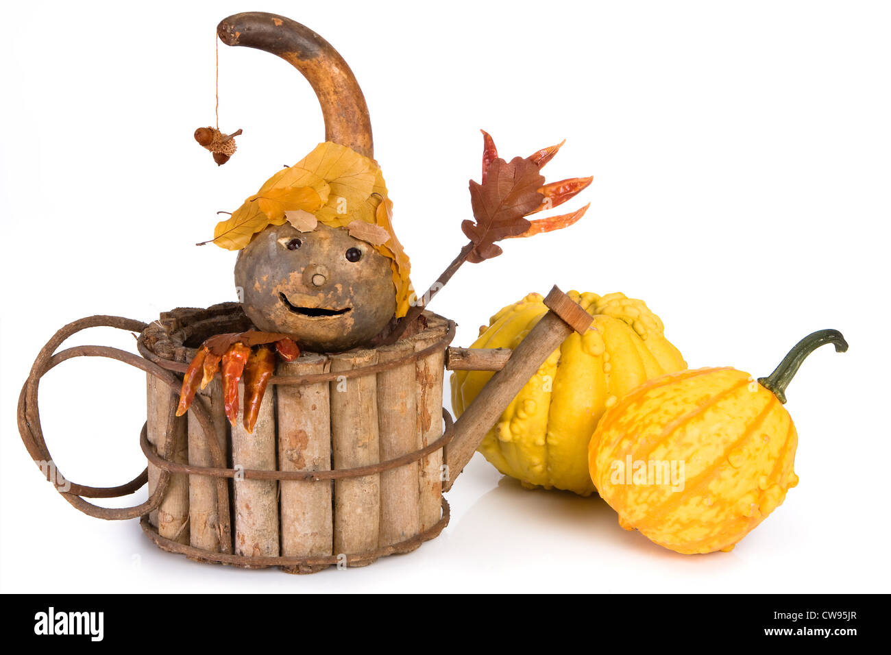 Puppet made of autumn materials and holiday pumpkins Stock Photo