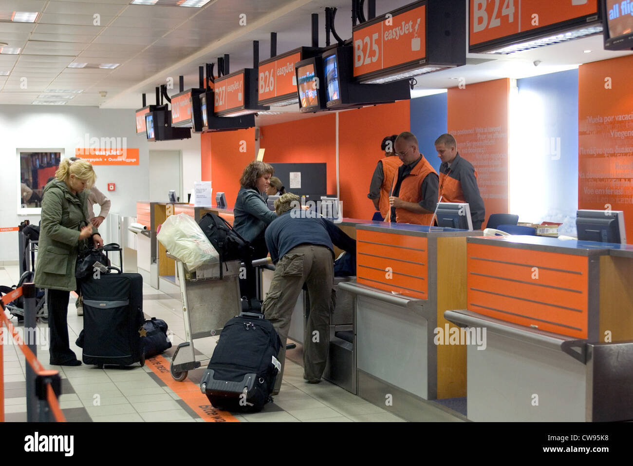 Berlin, the airline check-in easy jet at the airport Schoenefeld Stock Photo