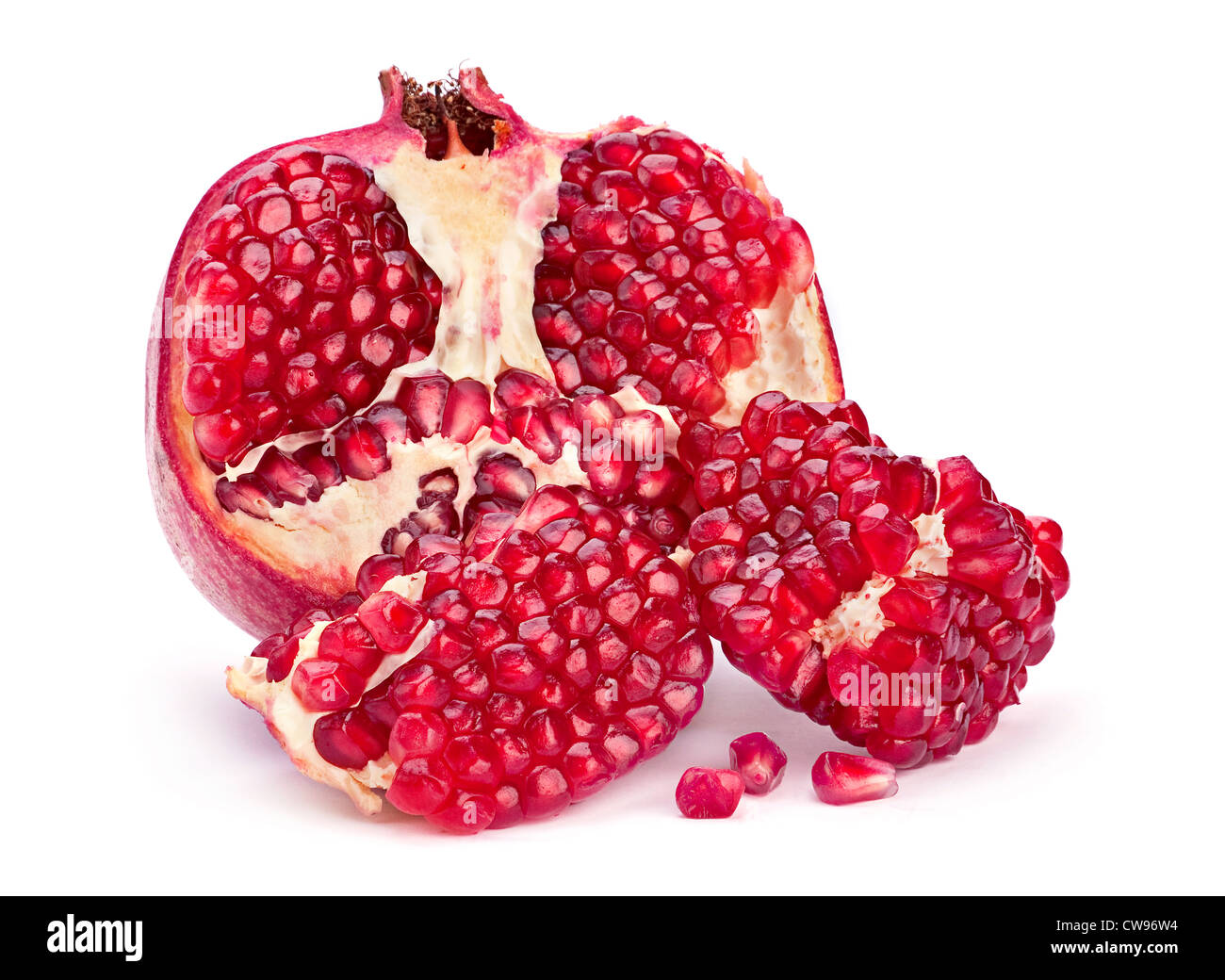 Pomegranate fruit closeup on white background Stock Photo