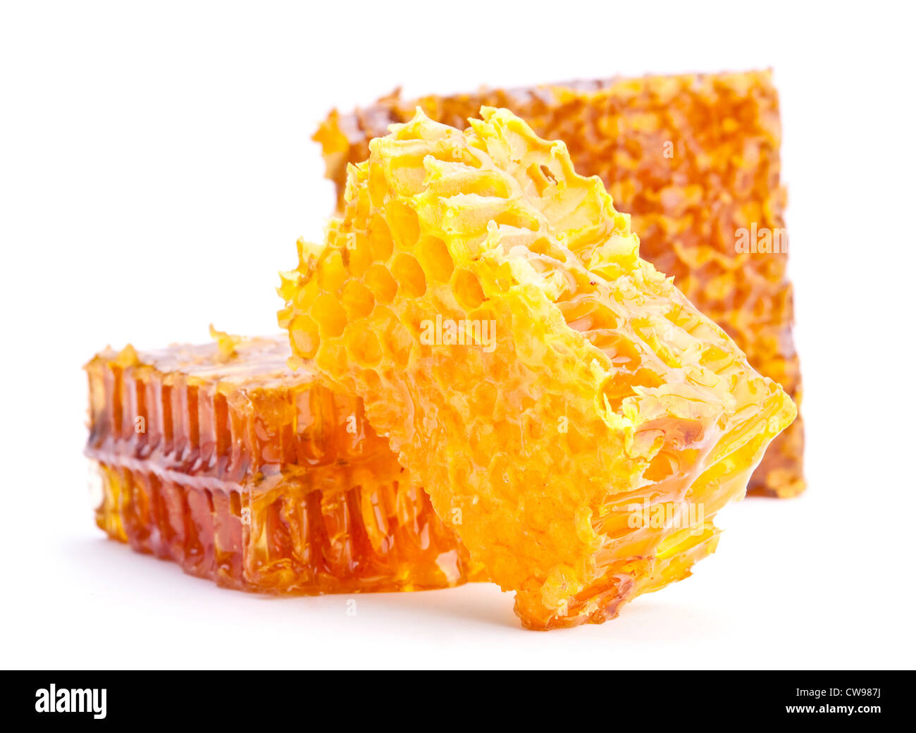 Yellow honeycomb slice closeup isolated Stock Photo
