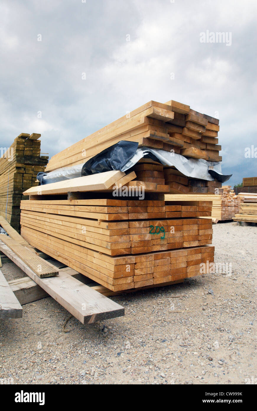 Stack of timber in builder's merchant yard. Stock Photo