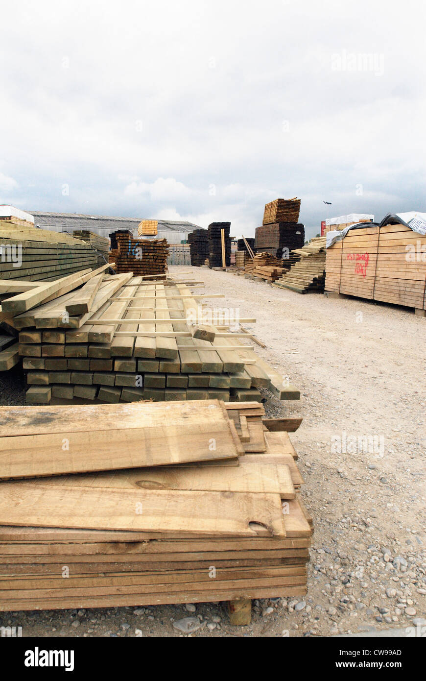 Stack of timber in builder's merchant yard. Stock Photo