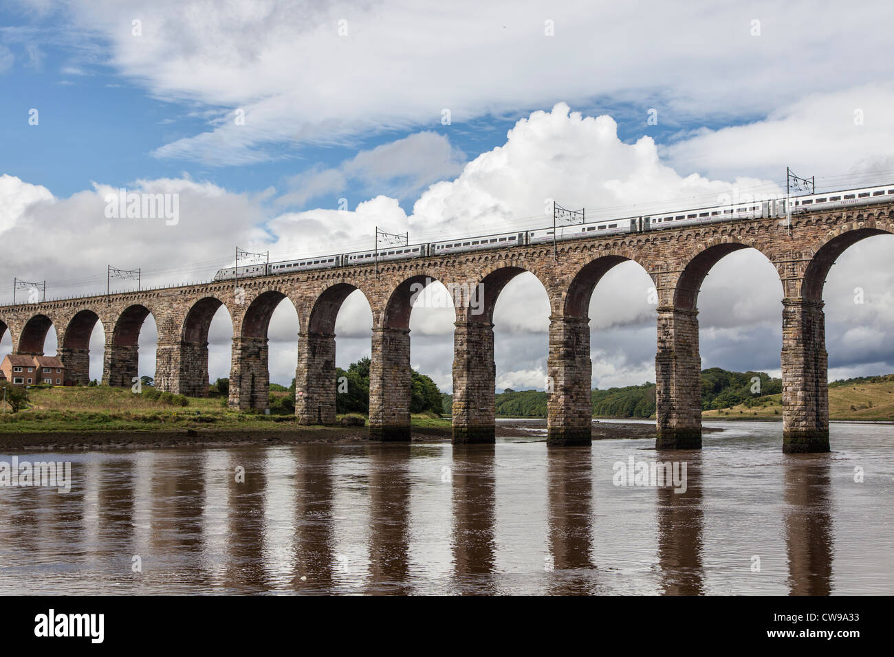 Royal Border Bridge, Berwick-upon-Tweed, designed by Robert Stevenson, carrying an East Coast Main Line train Stock Photo