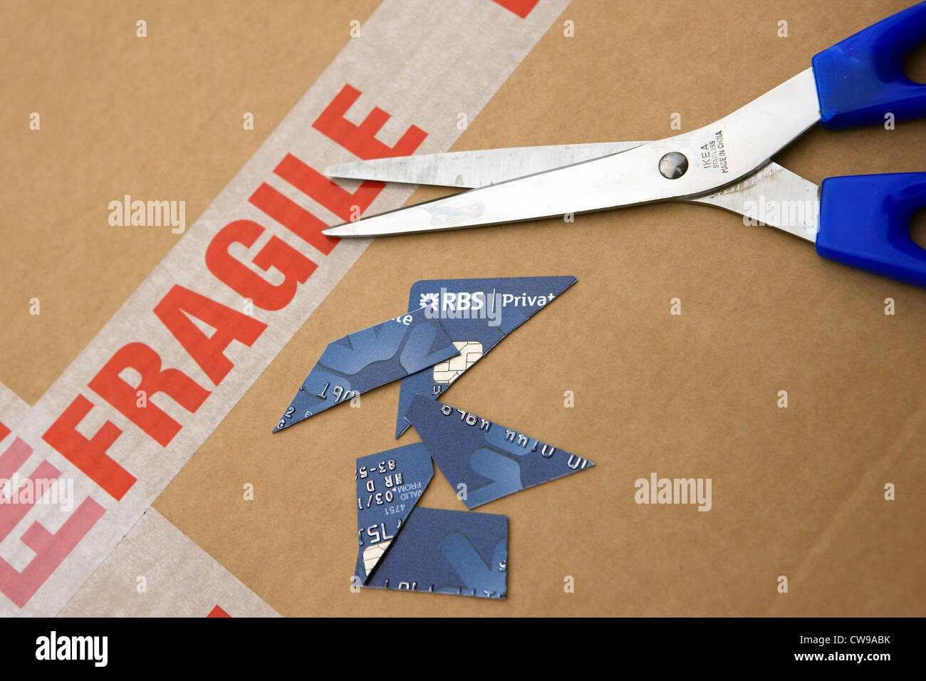 RBS bank card being cut up into pieces Stock Photo Alamy