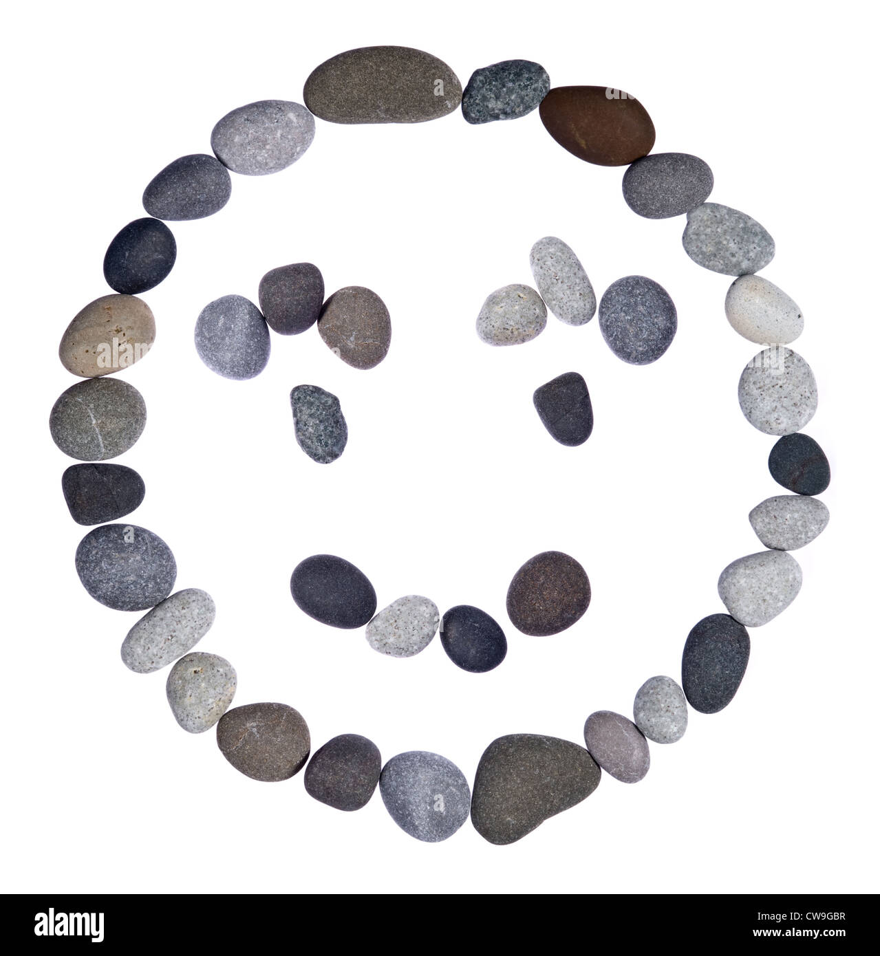 Emoticon smiley of stones on a white background Stock Photo