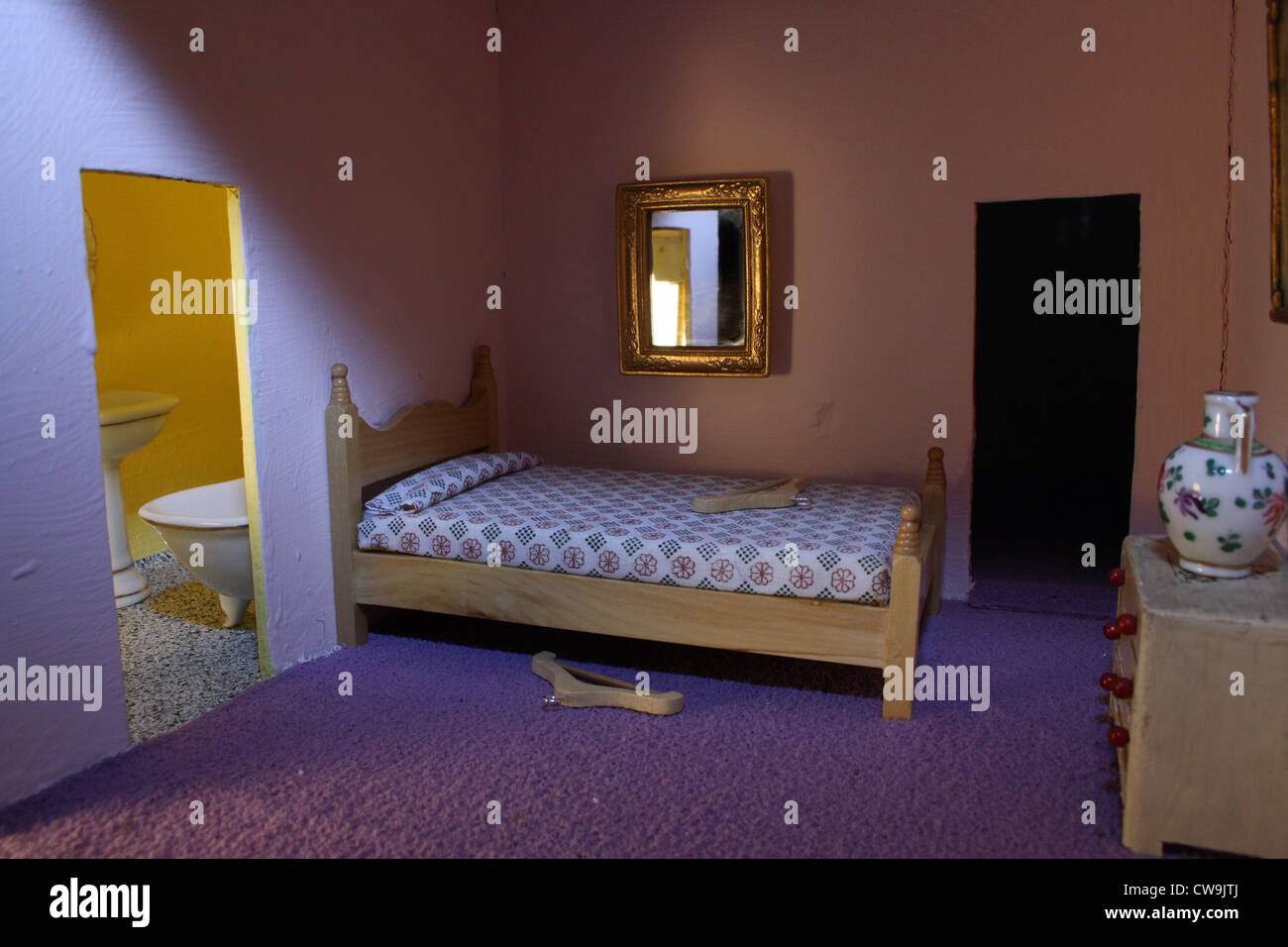Bedroom in a dolls house. Stock Photo