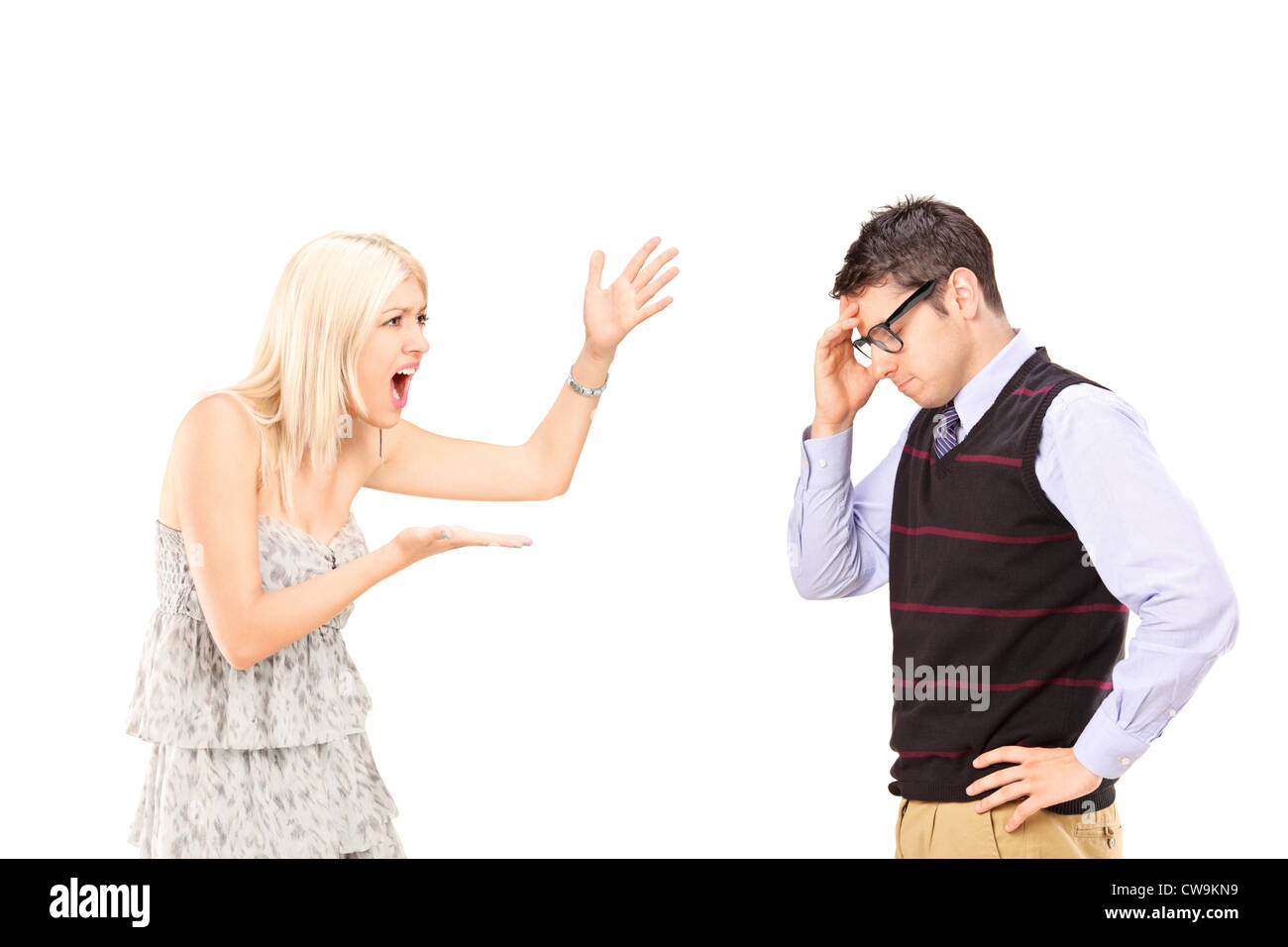 Angry woman shouting at a man, isolated on white background Stock Photo