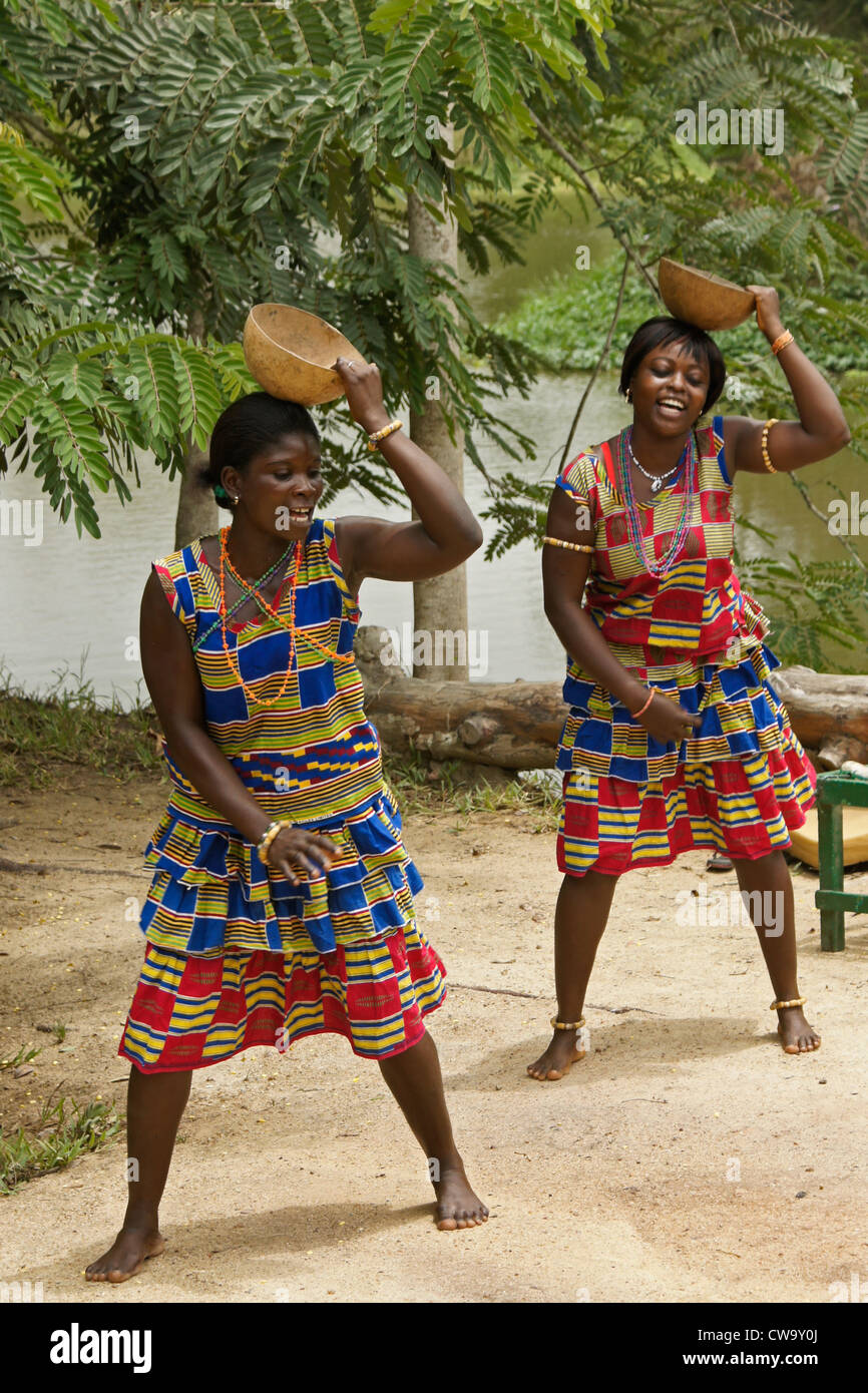 Women of Kukyekukyeko Bamboo Orchestra dancing and singing, Ghana Stock Photo